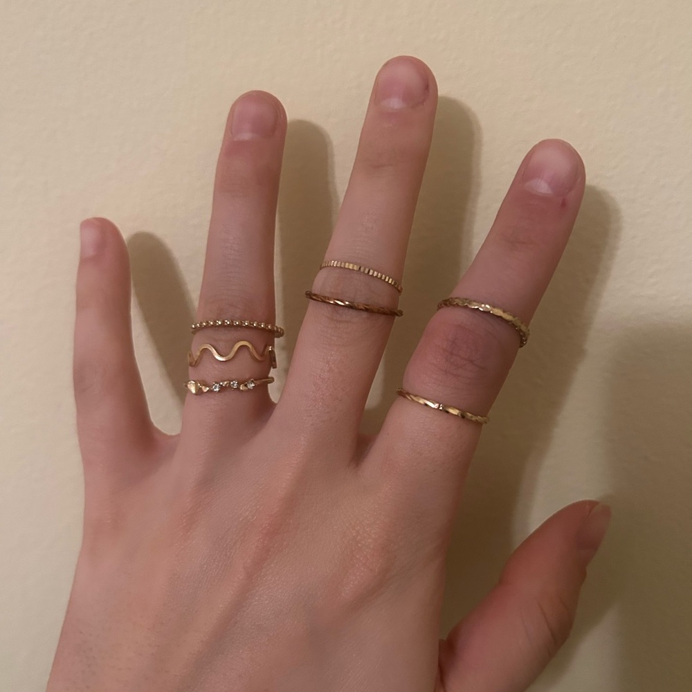 assorted gold rings